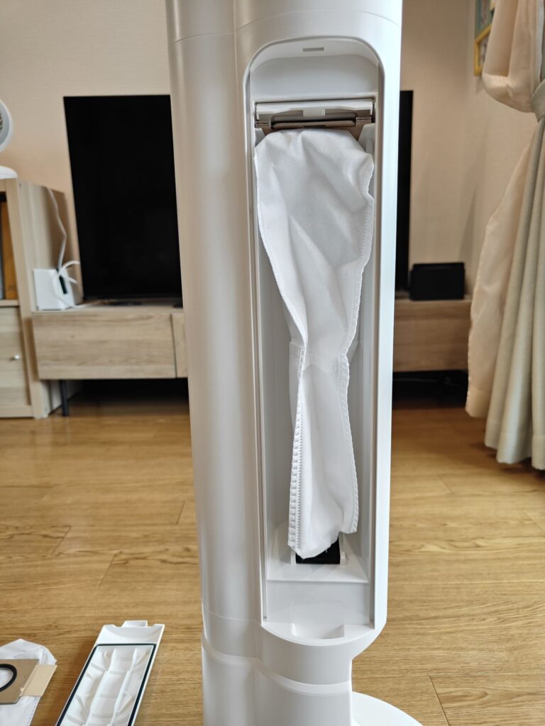 ステーションに集塵袋（紙パック）が装着済みの写真